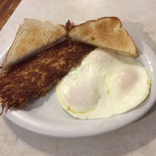 Three eggs over medium and extra crispy hash-brown, the way l like it..