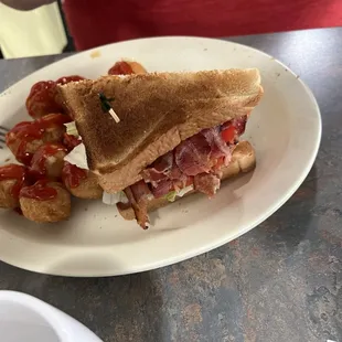 Double decker BLT with stuffed tater tots on regular menu