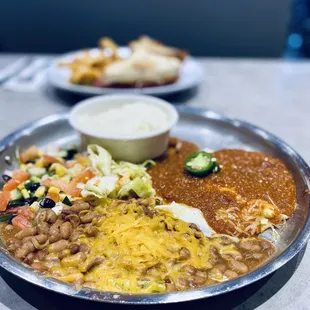 Pegs Glorified Huevos Ranchero with Grits