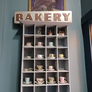  shelf with cups and saucers