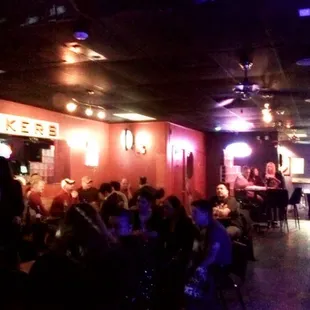 a crowd of people sitting at tables