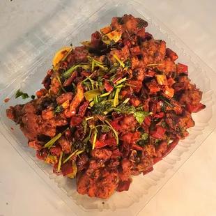 Spicy Sichuan Chicken - very bony but excellent taste!  Be careful chewing.