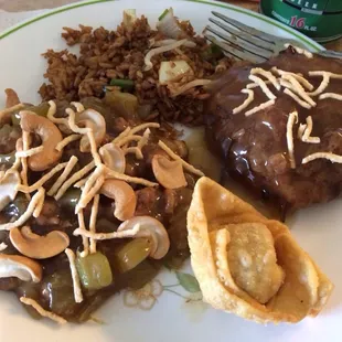 Cashew chicken dinner with fried rice and egg foo young. 7