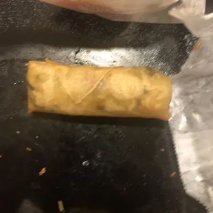 a roll of food on a table