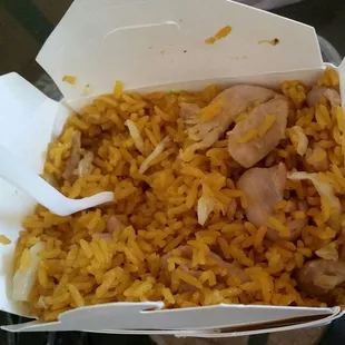 Chicken fried rice - a bunch of yellow rice with boiled chicken :/