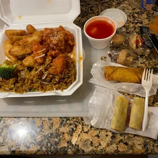 D. Sweet and Sour Chicken and Sesame Chicken, egg roll, and an order of spring rolls(2)
