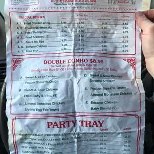 a person holding a piece of paper