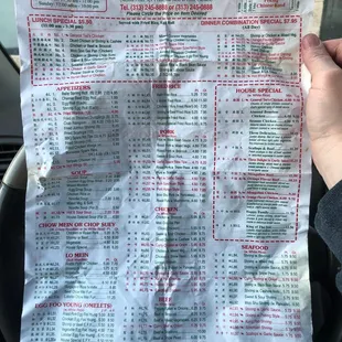 a person holding a piece of paper