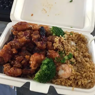 chicken and rice in a styrofoam container