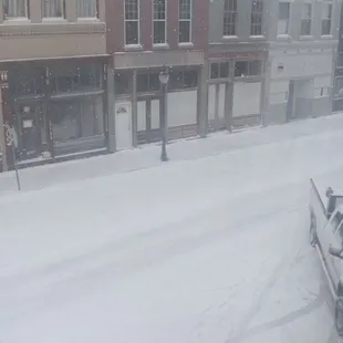 a view of a snowy street