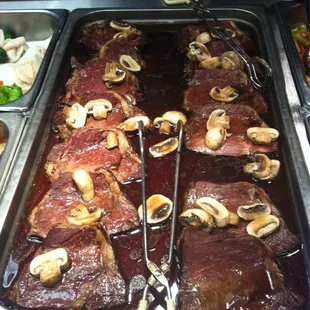 the meat being prepared for consumption