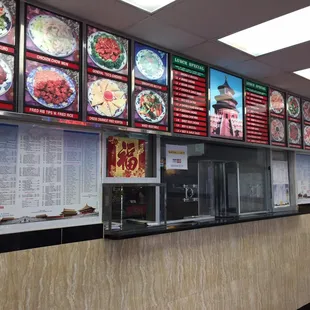 menus on the wall of the restaurant