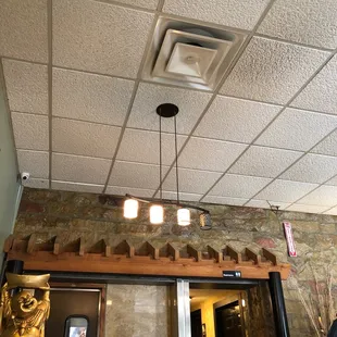 a restaurant with a ceiling fan