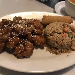 Sesame chicken with fried rice and egg roll!