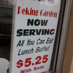 a sign in the window of a restaurant