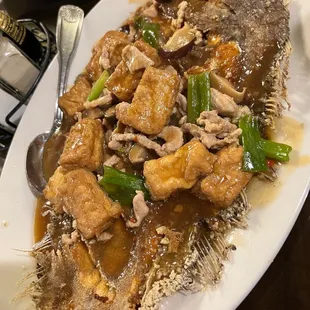 Fried sole with hot meat sauce