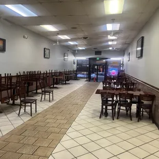 empty dining room with tables and chairs