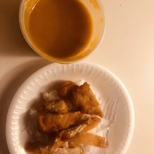 a plate of food and a cup of coffee