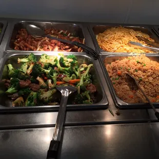a variety of food items in a buffet