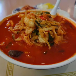 a bowl of soup on a table