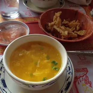 Egg drop soup, noodles and duck sauce, hot tea
