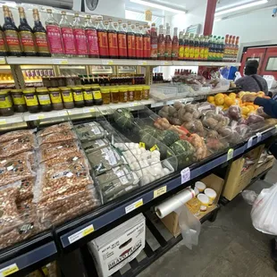 people shopping in a grocery store