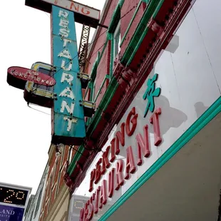 the neon sign for a chinese restaurant