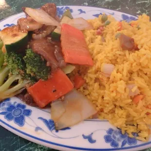 a plate of rice and vegetables