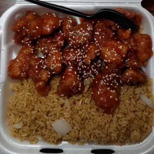 Sesame chicken lunch special. Comes with fried rice and either an egg roll or a drink. $5.50. Tons of food and pretty tasty.