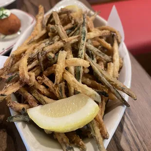 Fried Zucchini strings. One of 2 redeeming dishes of the meal. Though it begged for some sort of sauce or an acid besides the lemon.