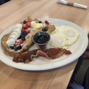 Aunt Bebop&apos;s French toast with eggs, bacon, and fruit.