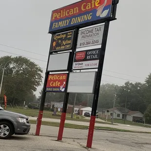 a sign for pelican cafe