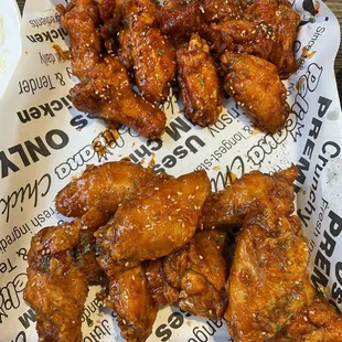 Smoky hot original wings (top) and signature original wings. Both are a must-try!