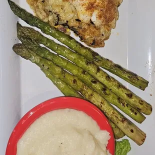 Stuffed roughy with grilled asparagus and garlic mashed potatoes..