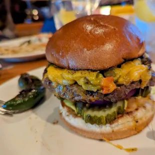 Half-pound green chile cheeseburger