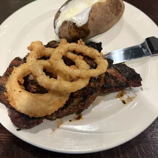 Charred ribeye with baked potato