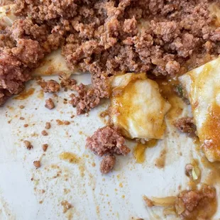 Under cooked dog food/Taco Bell meat.