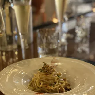 a plate of pasta on a table