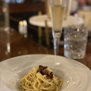 a plate of pasta on a table