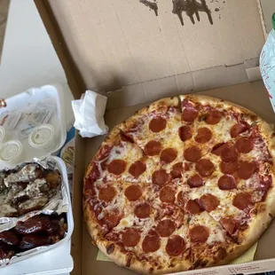 Pepperoni pizza with bbq wings and garlic Parmesan wings