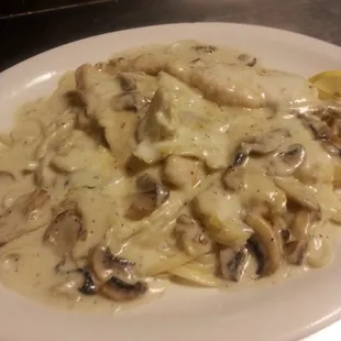 Chicken Pellegrino&apos;s is a house specialty. Made with Mushrooms and Artichokes in a rich creamy alfredo sauce.