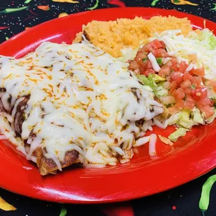 Enchiladas- 3 Chicken, shredded beef  or cheese enchiladas with your choice of red or green sauce. Served with rice and tossed salad.