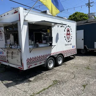 a food truck parked in a parking lot