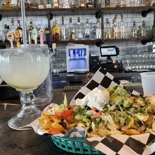 Margarita and Carne Asada Fries ‍