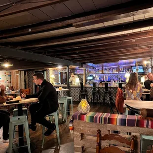 Interior by the bar. Sloped roof makes it unique.