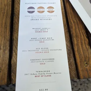 a menu on a wooden table