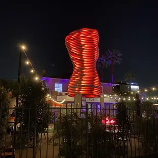 a tall red sculpture