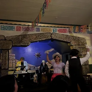 a man and a woman in a mexican costume