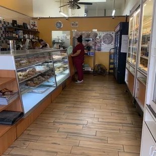 a woman standing in front of the counter