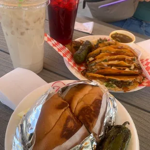 Carne asada torta, 5 quesa birria tacos with consome, large horchata and Jamaica agua fresca